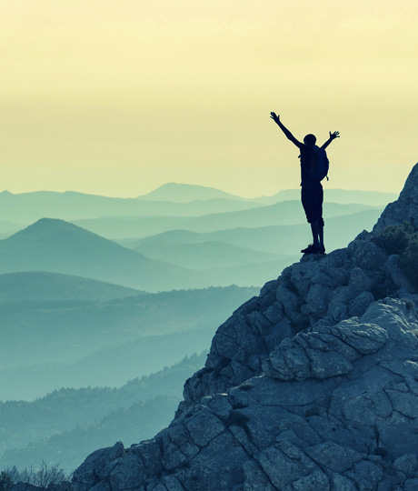 Man stands on clifftop